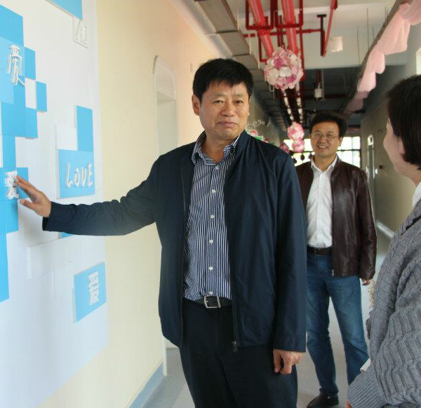 长兴县教育局张向前局长来园视察工作